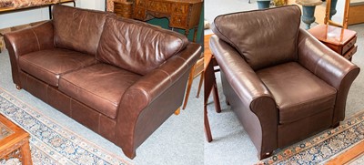 Lot 1139 - A brown leather two piece suite, comprising...