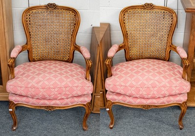 Lot 1193 - A pair of fauteuil with cane work back rest...