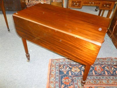 Lot 1171 - A William IV Mahogany Pembroke Table, circa 1830, raised on ring turned and reeded tapering...