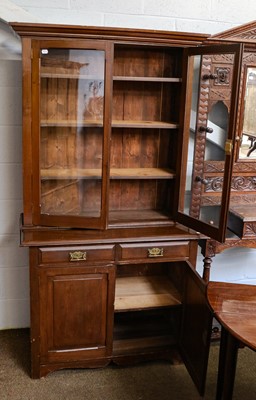 Lot 1211 - An early 20th century mahogany bookcase with...