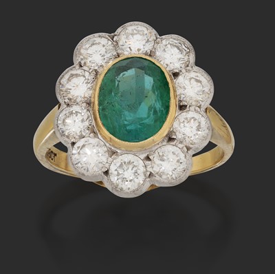 Lot 2353 - An Emerald and Diamond Cluster Ring
