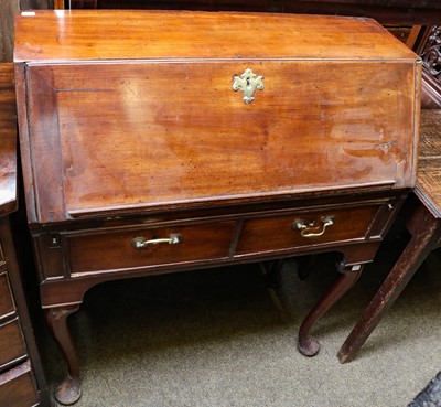 Lot 1306 - A George III mahogany bureau with two drawers...