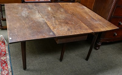 Lot 1226 - A George III oak drop leaf table, 161cm (open)...