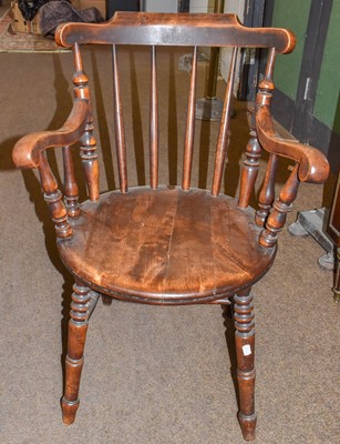 Lot 1310 - A 19th century spindle back Penny arm chair