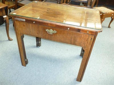 Lot 1174 - A George III Mahogany Architect's Table, late 18th century, the moulded top with re-entrant corners