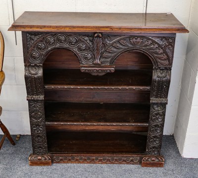 Lot 1154 - A Jacobean style oak open bookcase with...