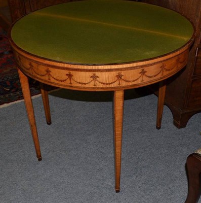 Lot 1175 - A George III Satinwood, Harewood and Tulip Banded Foldover Card Table, late 18th century, raised on