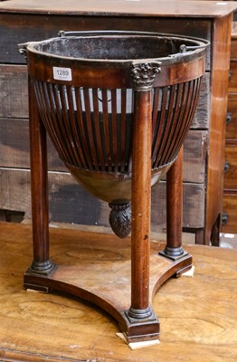 Lot 1289 - A 19th century mahogany neo classical planter...