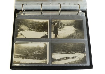 Lot 231 - A Green album containing approx. 190 postcards,...