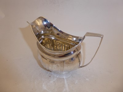 Lot 2189 - A George III Silver Teapot and An Associated George III Silver Cream-Jug and Sugar-Bowl