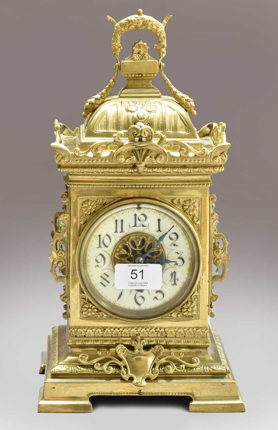 Lot 51 - A French brass cased mantel timepiece, Arabic...
