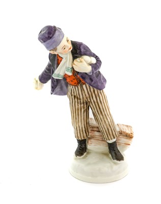 Lot 99 - A Meissen Porcelain Figure of a Boy Throwing...