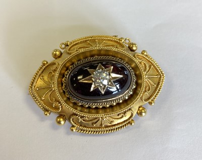 Lot 2025 - A Victorian Garnet and Diamond Brooch, Bangle and Bracelet