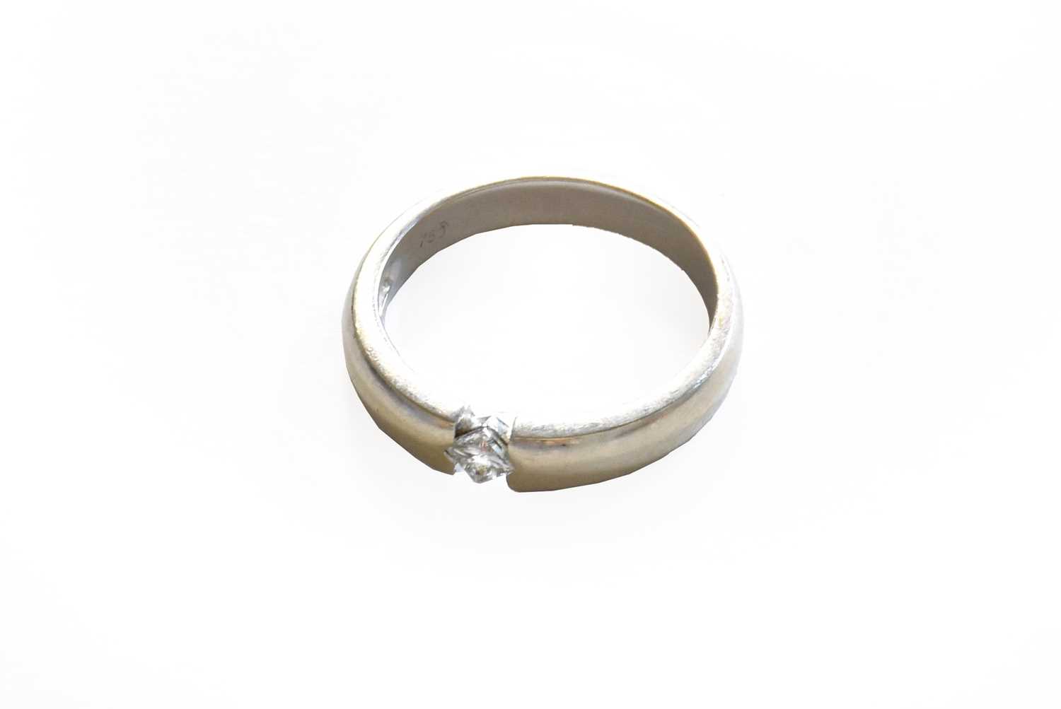 Lot 8 - A diamond solitaire ring, stamped '750',...