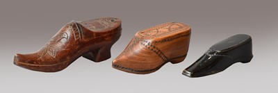Lot 111 - A Victorian boot form carved wooden snuff box...