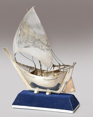 Lot 103 - A silver model of a boat stamped silver 925,...