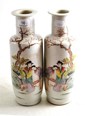 Lot 16 - A pair of Chinese porcelain vases decorated with women and children