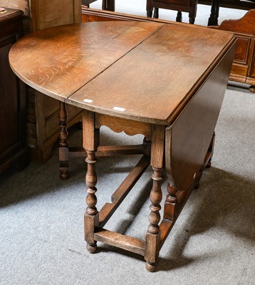 Lot 1288 - An oak gateleg table, 138cm by 107cm by 75cm