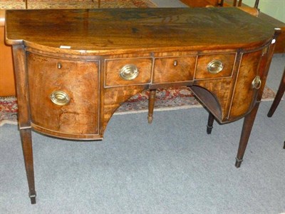 Lot 1179 - A George III Mahogany Bowfront Sideboard, early 19th century, the central frieze drawer flanked...