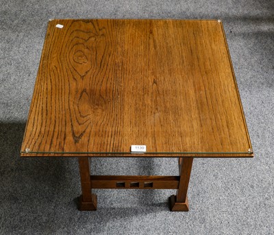 Lot 1130 - An Arts & Crafts oak small coffee table, 61cm...