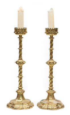 Lot 174 - A Pair of Victorian Brass Candlestands, in...
