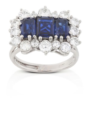 Lot 2321 - A Sapphire and Diamond Cluster Ring