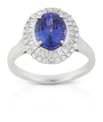 Lot 2319 - A Platinum Tanzanite and Diamond Cluster Ring