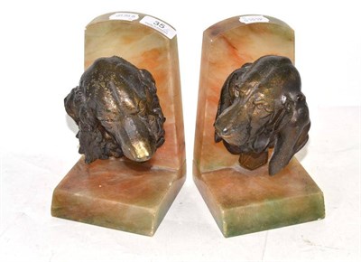 Lot 35 - Pair of early 20th century spelter dogs head bookends, one inscribed Lecourtier