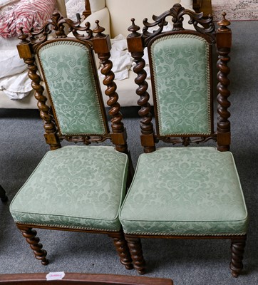 Lot 1197 - A pair of Victorian walnut hall chairs with...