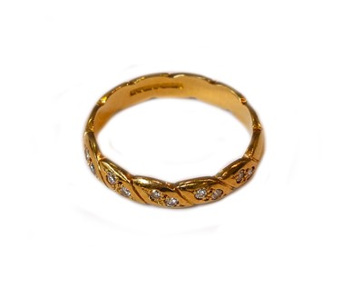 Lot 222 - An 18 carat gold diamond half hoop ring,...
