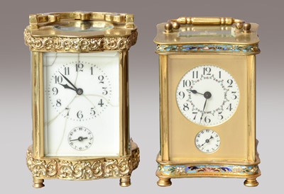 Lot 136 - A brass and champleve enamel alarm timepiece,...