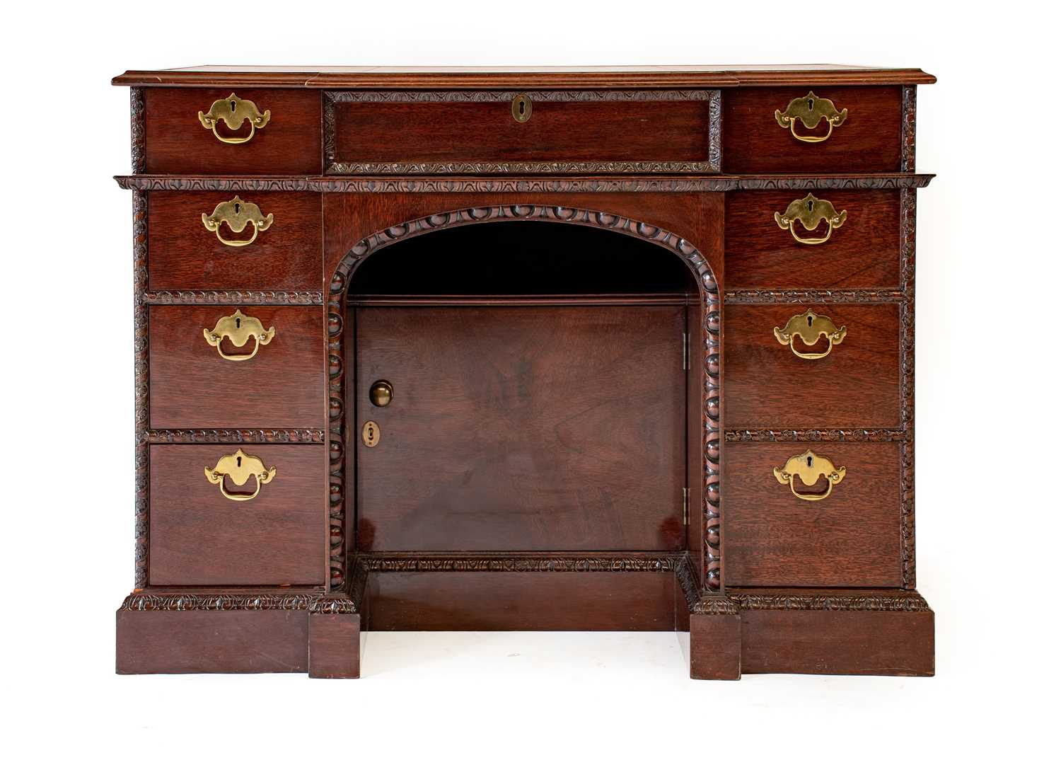 Lot 308 - A Reproduction Carved Mahogany Desk, after the...