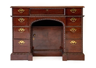 Lot 308 - A Reproduction Carved Mahogany Desk, after the...