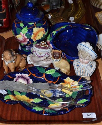 Lot 42 - Maling Peony basket, shaped dish and vase and cover, two Continental pugs, a 'hand' trinket box and