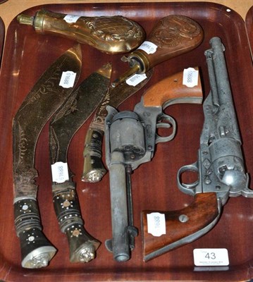 Lot 43 - Two replica revolvers; three kukri and two copper powder flasks