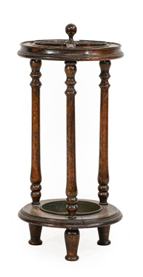 Lot 1344 - A 1920s Mahogany Whip/Stick Stand, of circular...