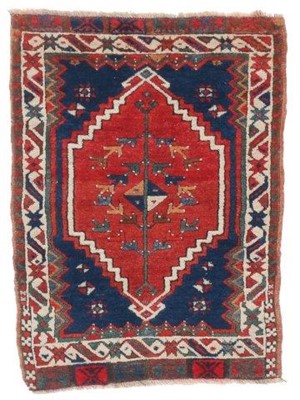 Lot 387 - Anatolian Yastik, late 19th century The indigo...