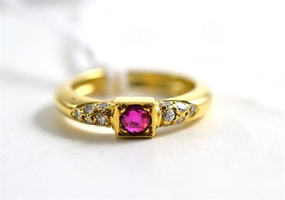 Lot 53 - An 18ct gold ruby and diamond ring