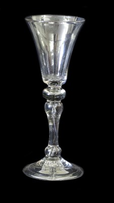 Lot 12 - A Cordial Glass, circa 1750, the drawn trumpet...