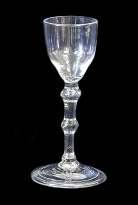 Lot 216 - A Balustroid wine glass, circa 1740, the ogee...