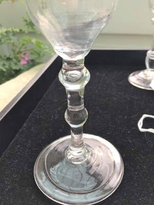 Lot 216 - A Balustroid wine glass, circa 1740, the ogee...