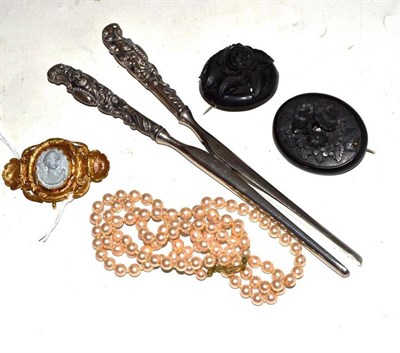 Lot 58 - Two Victorian jet brooches, a Victorian lava brooch, simulated pearls and a pair of glove...