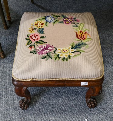 Lot 1202 - A late Victorian oak stool with claw feet,...