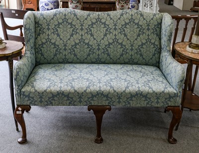 Lot 1145 - A Queen Anne style two-seater sofa upholstered...