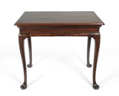 Lot 1184 - A George II Mahogany Side Table, mid 18th century, the moulded top raised on cabriole legs with pad