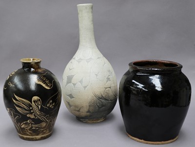 Lot 34 - A Chinese Cizhou Vase; together with two...