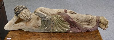Lot 1176 - A painted wood figure of a reclining buddha, 90cm