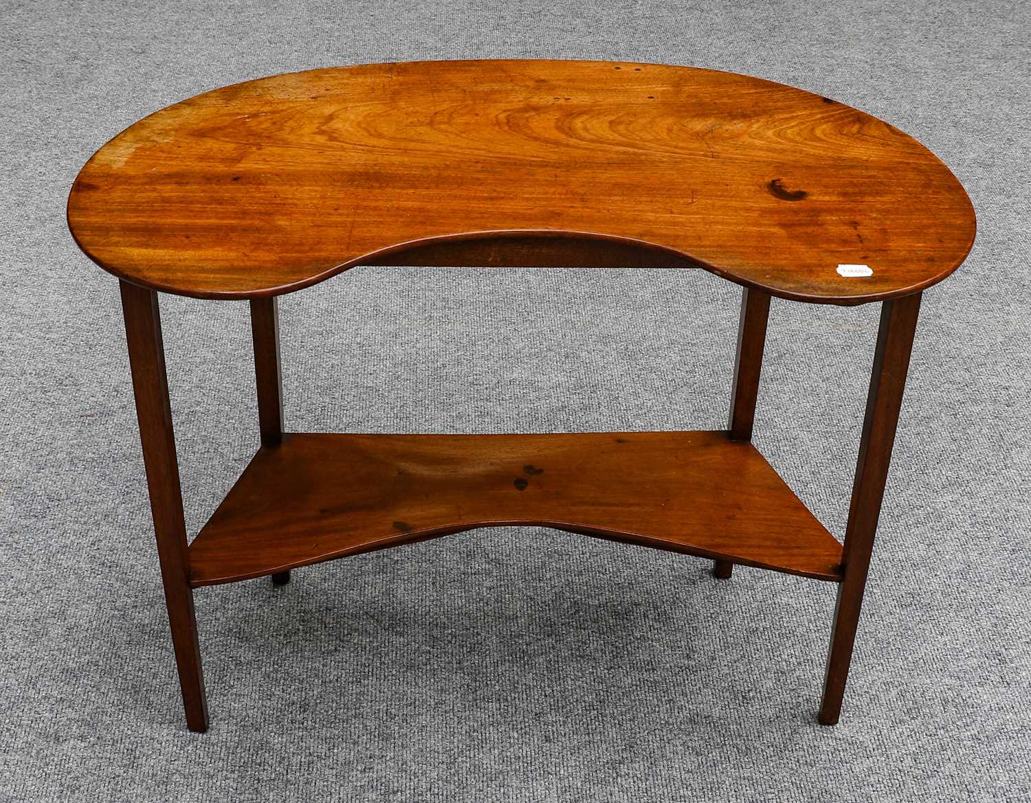 Lot 1330 - A mahogany reniform occasional table, the