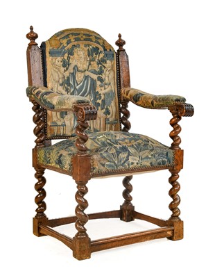 Lot 777 - A Flemish Walnut Open Armchair, covered in old...