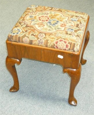 Lot 1186 - A George II Walnut Dressing Stool, early 18th century, with later floral needlework drop-in...